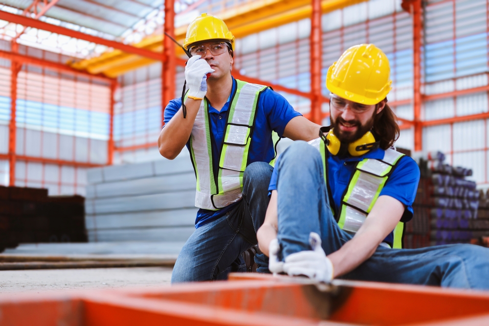 Caucasian,Foreman,Using,Walkie-talkie,To,Contact,Safety,Team,For,Help