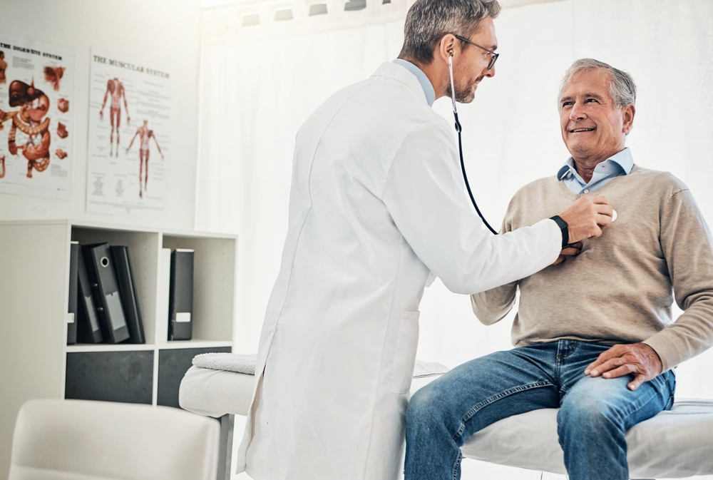 Consultation,,Man,And,Doctor,In,Checkup,With,Stethoscope,,Help,And