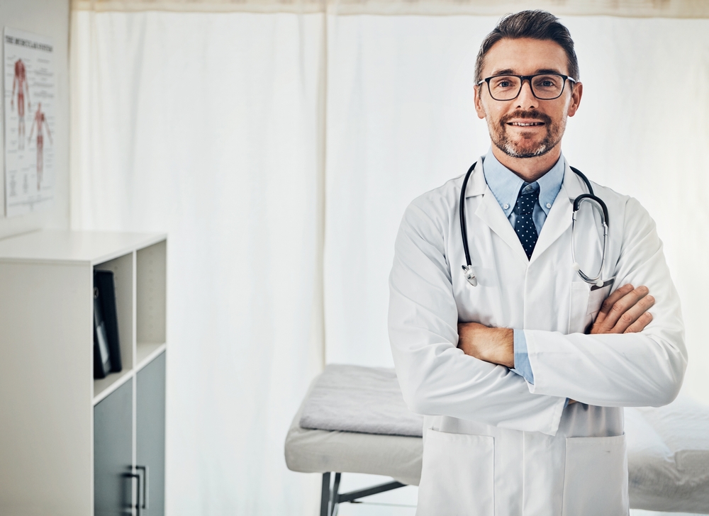 Health,,Portrait,And,Mature,Man,With,Arms,Crossed,In,Hospital